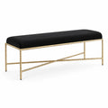 Banc en tissu noir avec cadre en métal doré