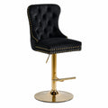Tabouret de bar en velours noir et métal doré